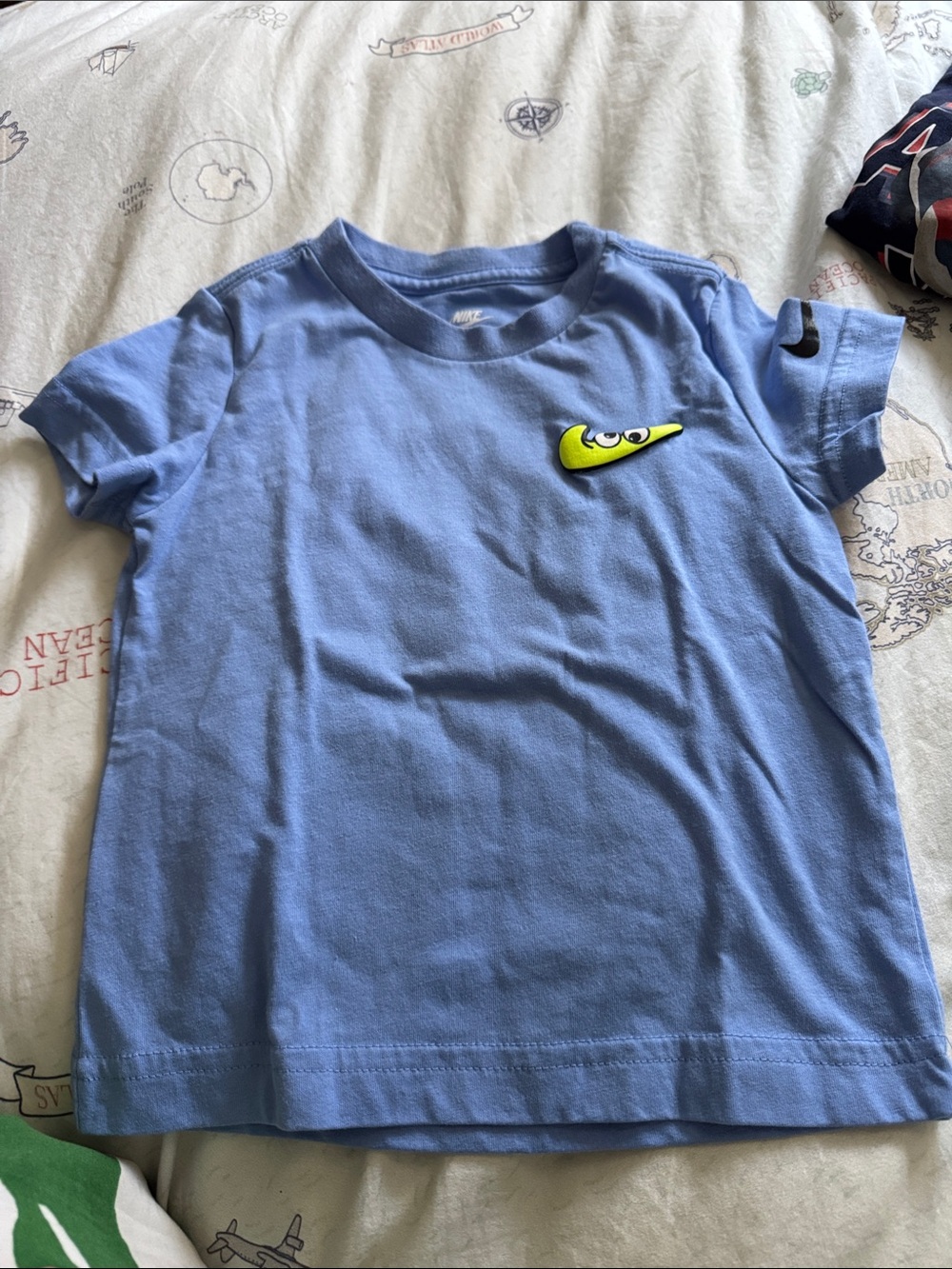 Nike Light Blue Kids' Short Sleeve Tee with Neon Yellow Swoosh Accent